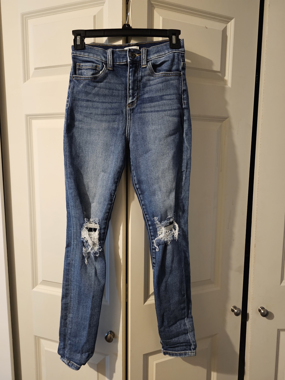 Sneak Peek Light Blue Ripped Skinny Jeans